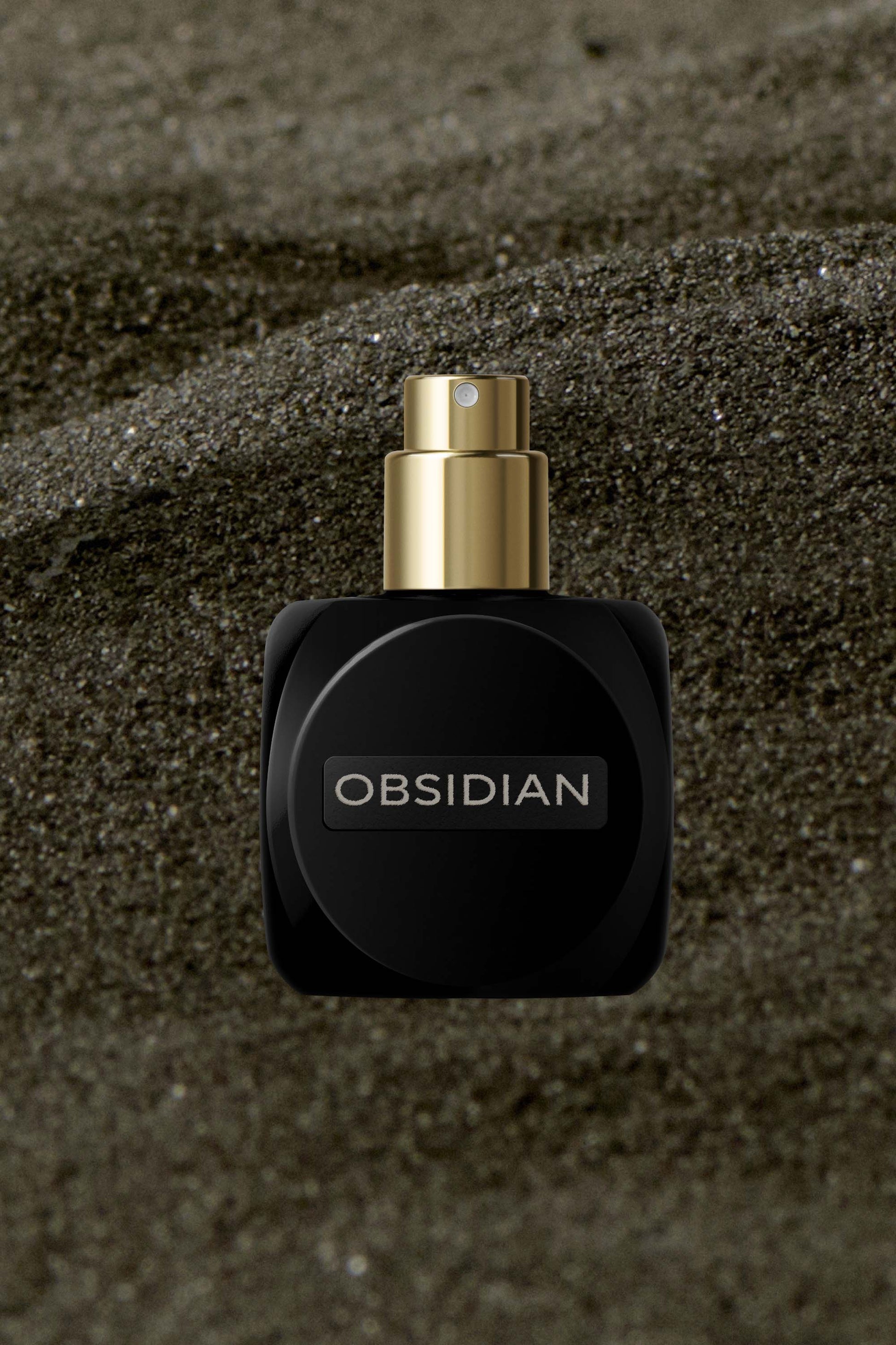 Osmé Obsidian extrait de parfum bottle front view with clean black glass packaging