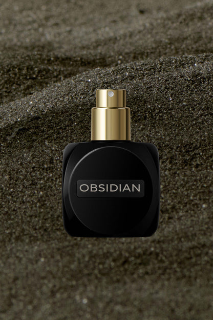 Osmé Obsidian extrait de parfum bottle front view with clean black glass packaging